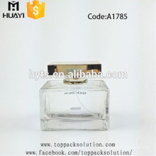 quadratische Glasparfümflasche der Goldkappe